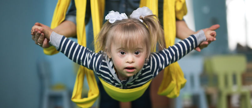 Child in therapy swing
